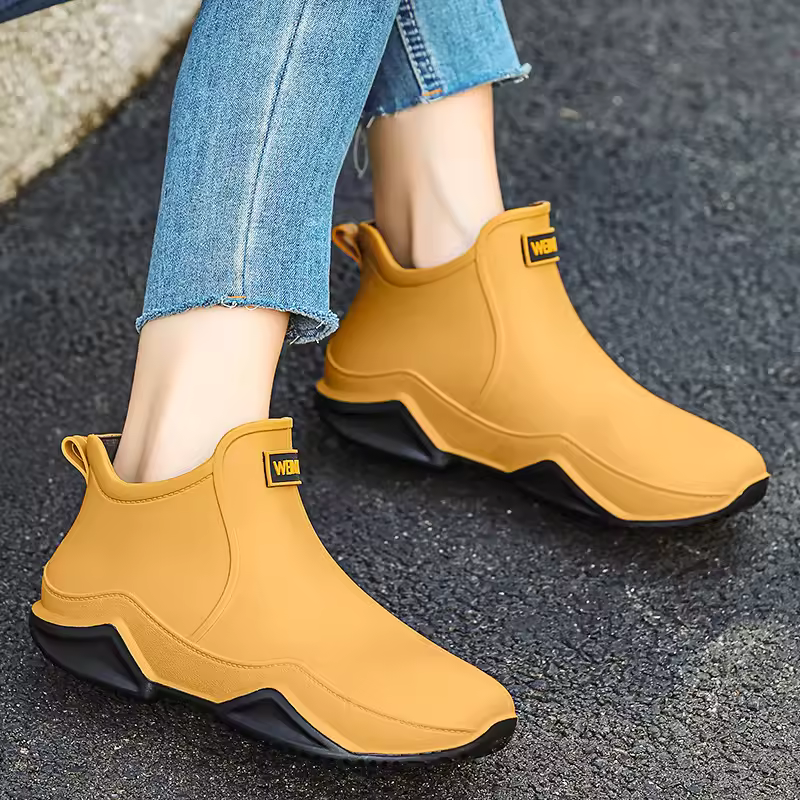 Women's waterproof slip-on rain ankle boots for ultimate wet-weather protection and style.
