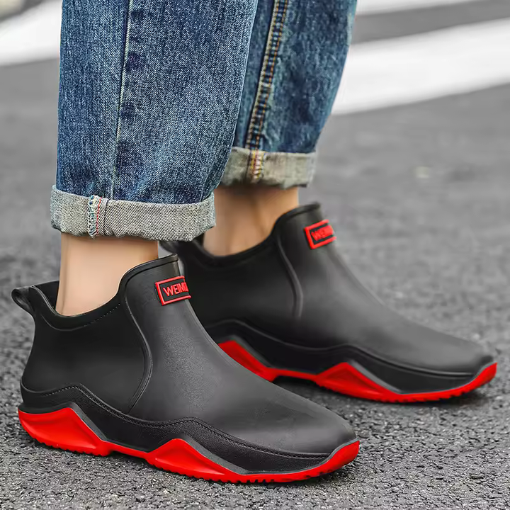 Easy slip-on women's waterproof ankle rain boots, perfect for casual wear in wet conditions.