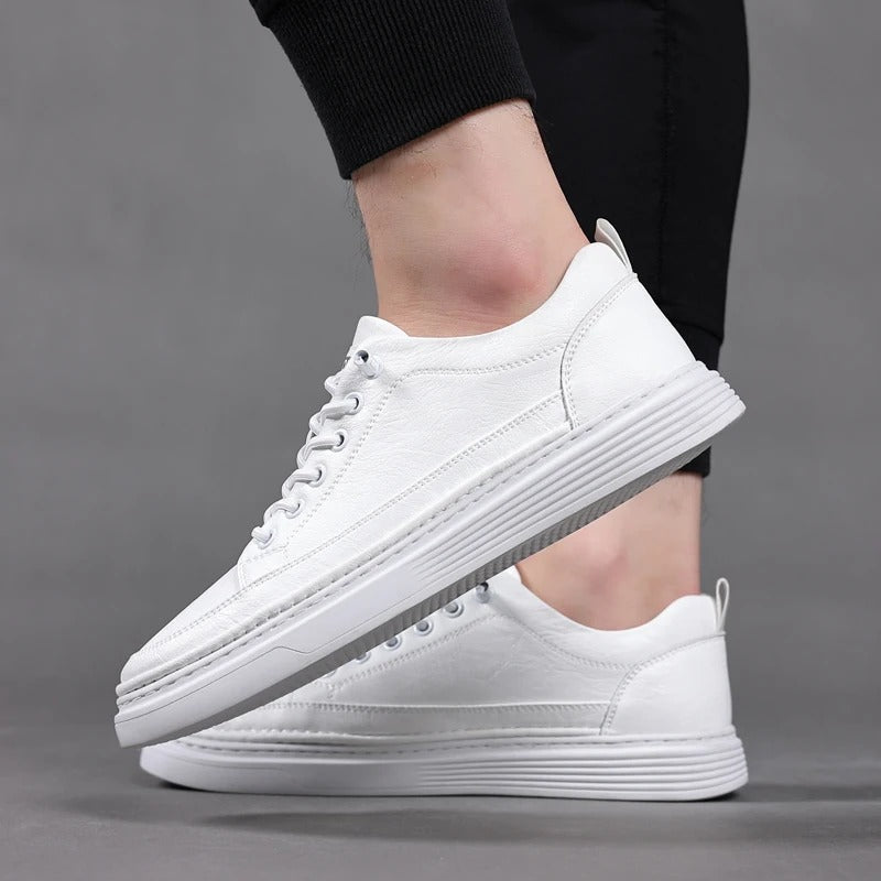 Top-down view of women's lace-up leather casual sneakers, highlighting the clean lines
