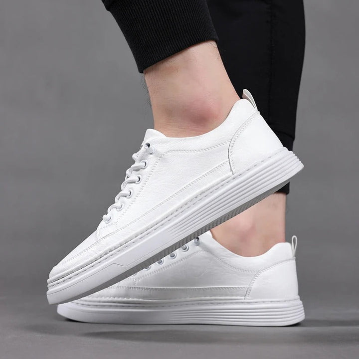 Top-down view of women's lace-up leather casual sneakers, highlighting the clean lines