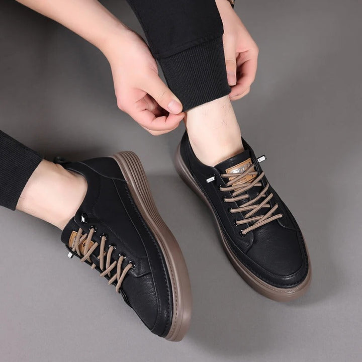 Stylish women's leather sneakers in black, perfect for casual wear and daily walks