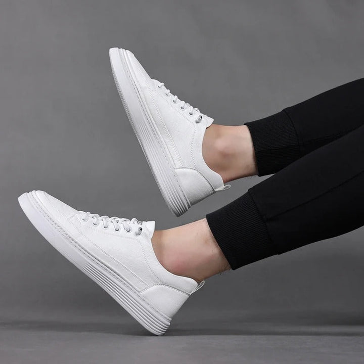A single women's leather casual sneaker, showcasing its elegant profile and comfort