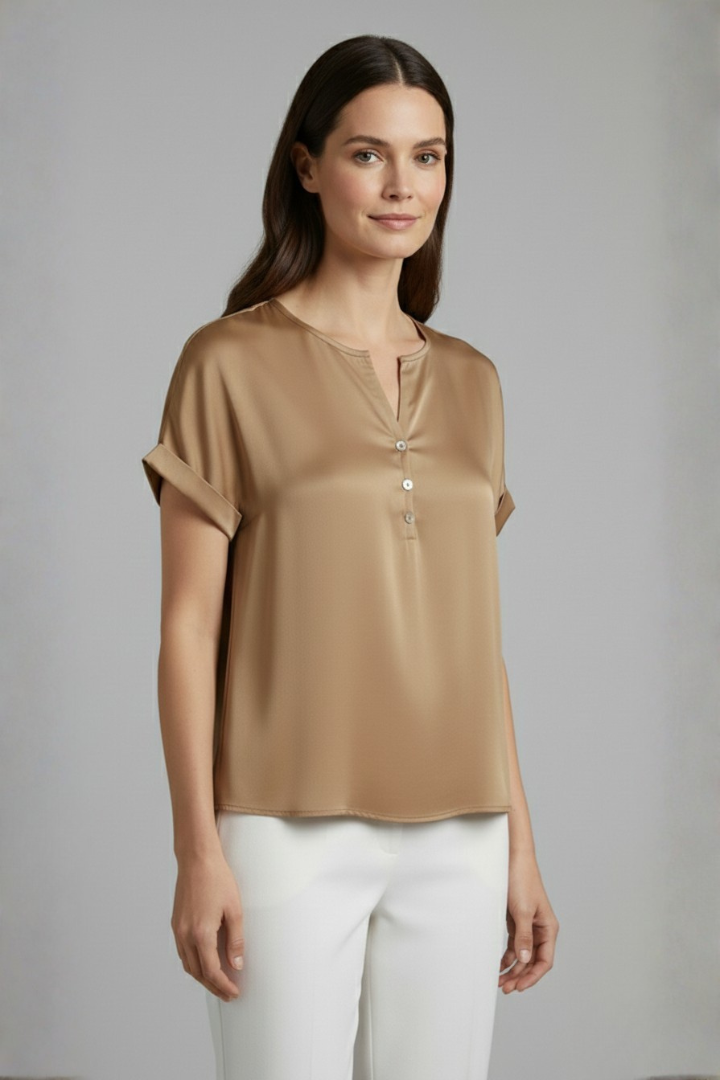 Soft pink V-neck top for women, a loose fit everyday comfort shirt.
