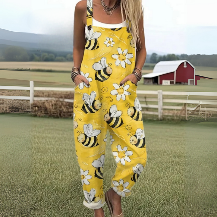 Relaxed fit women's wide leg jumpsuit featuring unique flying bees embroidery. Perfect for casual spring/summer outfits.