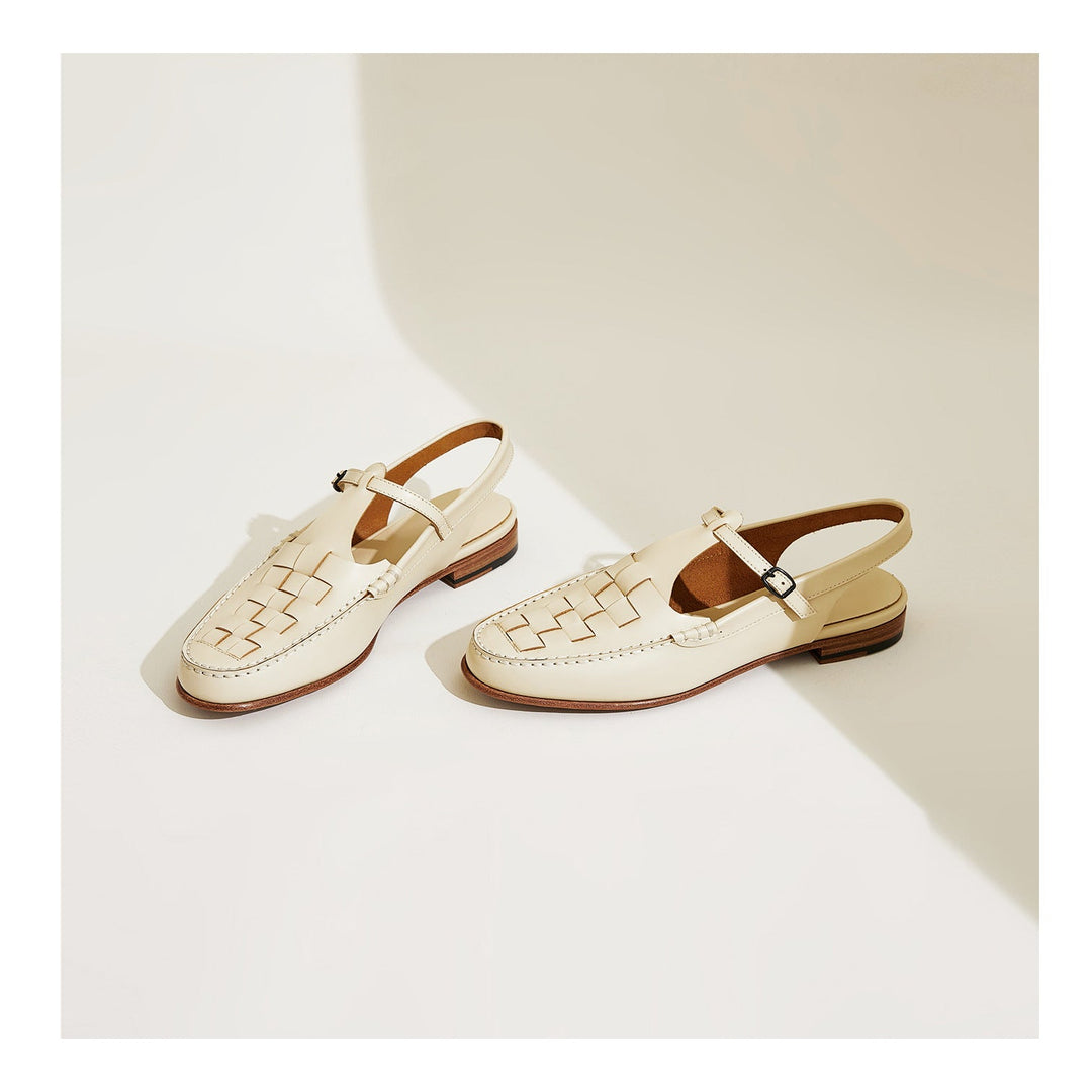 Leather slingback sandals for women, featuring a classic woven pattern and comfortable fit.