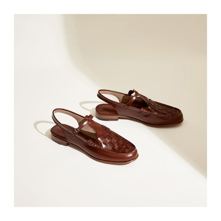 Tan women's slingback sandals made from high-quality woven leather, ideal for warm weather.