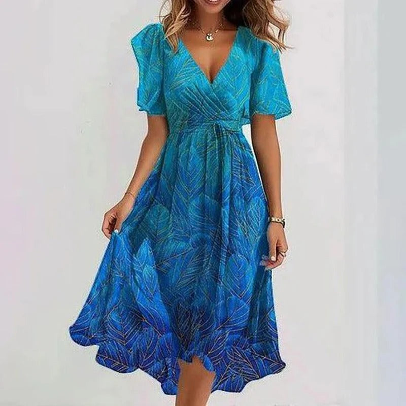 Versatile women's wrap V-neck midi dress with flutter sleeves, suitable for casual or elegant wear.