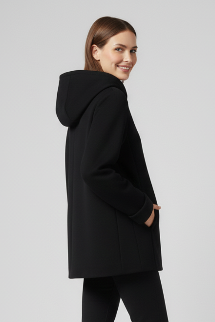 Casual women's zip-up hooded jacket featuring front pockets, a versatile & comfortable everyday essential.