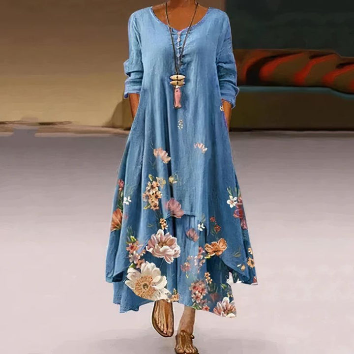 Women's boho maxi dress with long sleeves, layered hem, asymmetrical cut, and relaxed fit; ideal for spring outings.