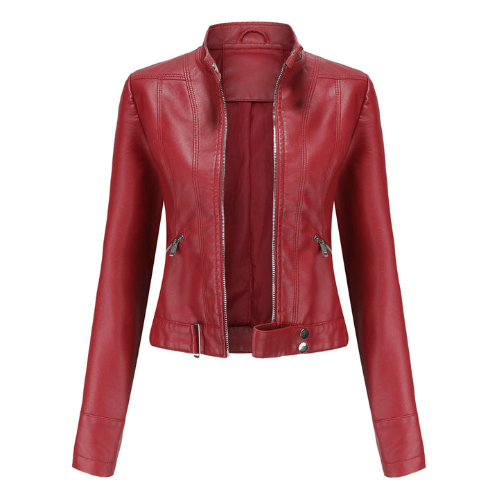 Women's faux leather biker jacket with sleek texture, dual zippers, and flap accents, showcasing a classic edgy style.