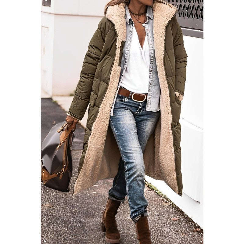 "Women's hooded longline quilted winter coat, front view; insulated, open front design with quilted texture and hood."