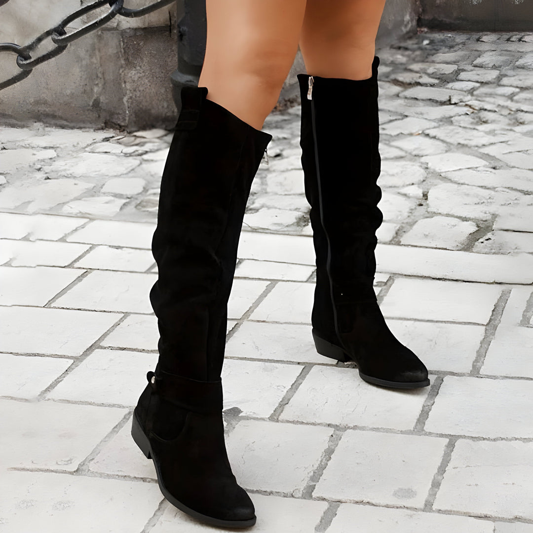 Women's leather knee-high boots with non-slip sole, showcasing supple leather, side zipper, and sleek, elegant design.