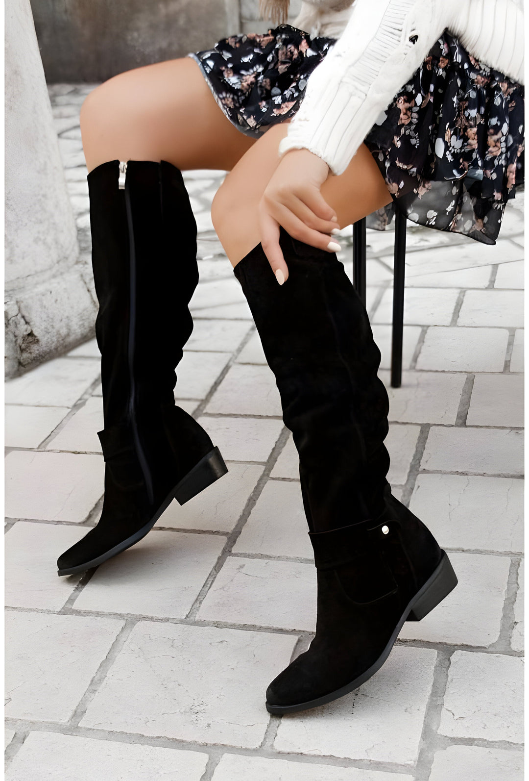 Women's leather knee-high boots with non-slip sole, showcasing supple leather, side zipper, and sleek, elegant design.