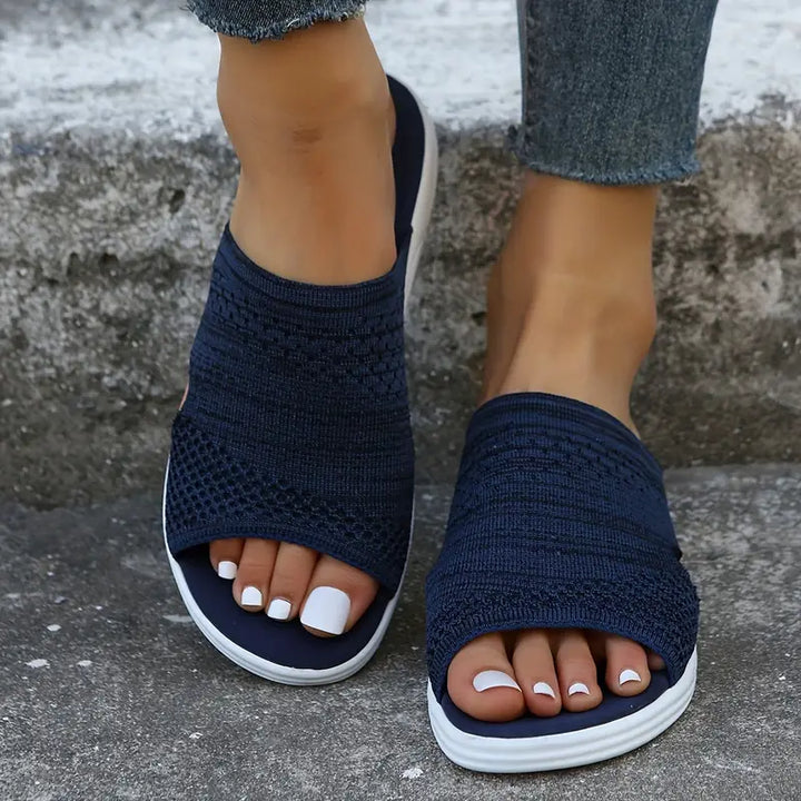 "Women's orthopedic open-toe knit sandals with contoured sole, stretch-knit upper, and slip-on design for comfort and style."