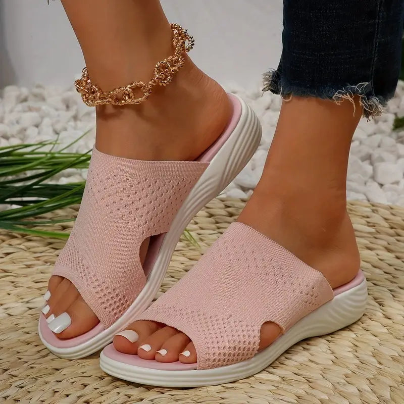"Women's orthopedic open-toe knit sandals with contoured sole, stretch-knit upper, and slip-on design for comfort and style."