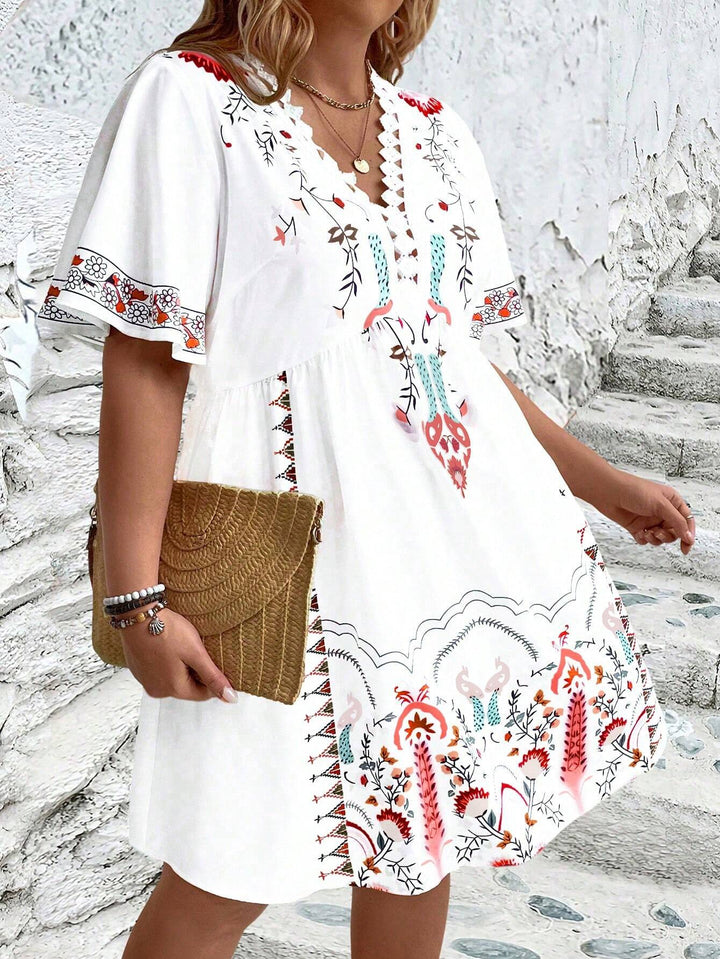 Women's plus size midi dress with boho lace, featuring intricate details and flowing silhouette, front view.