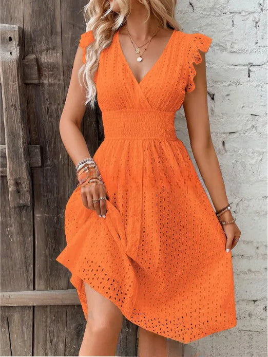 "Women's V-Neck eyelet summer dress with smocked waist, ruffled sleeves, and knee-length A-line in light fabric."