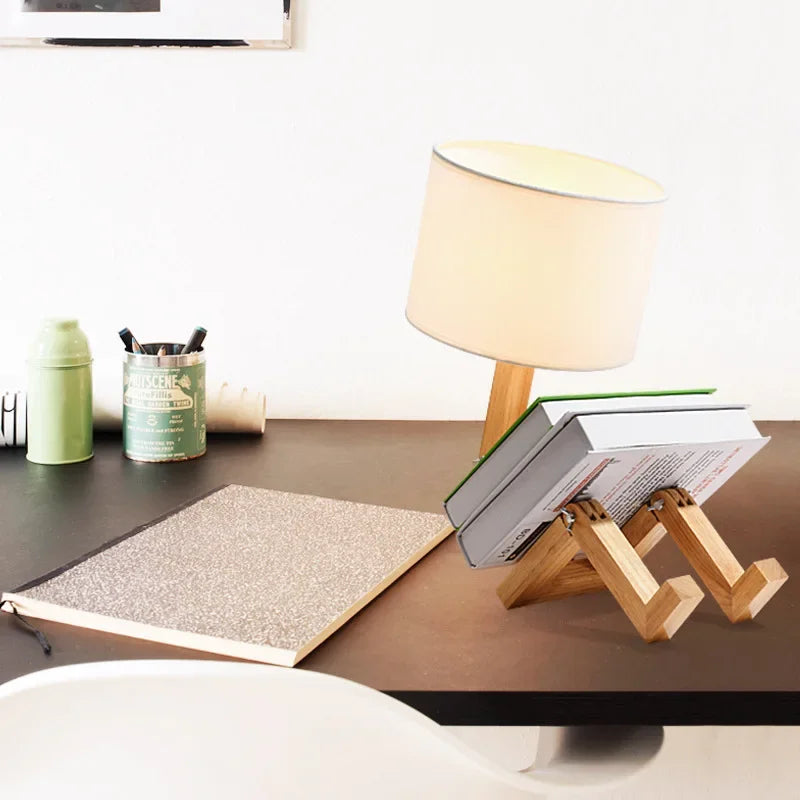Stylish wooden robot lamp. Adjustable head & arms, perfect unique lighting for modern home decor.