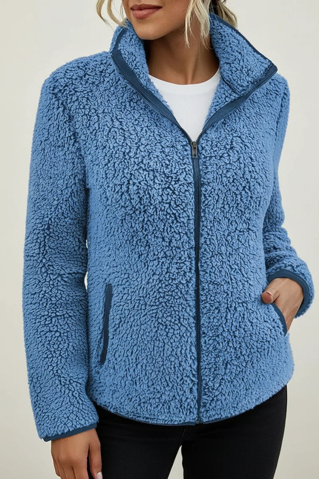 Effortlessly warm women's cozy plush winter jacket, a stylish zip-up coat with a stand collar for cold days.