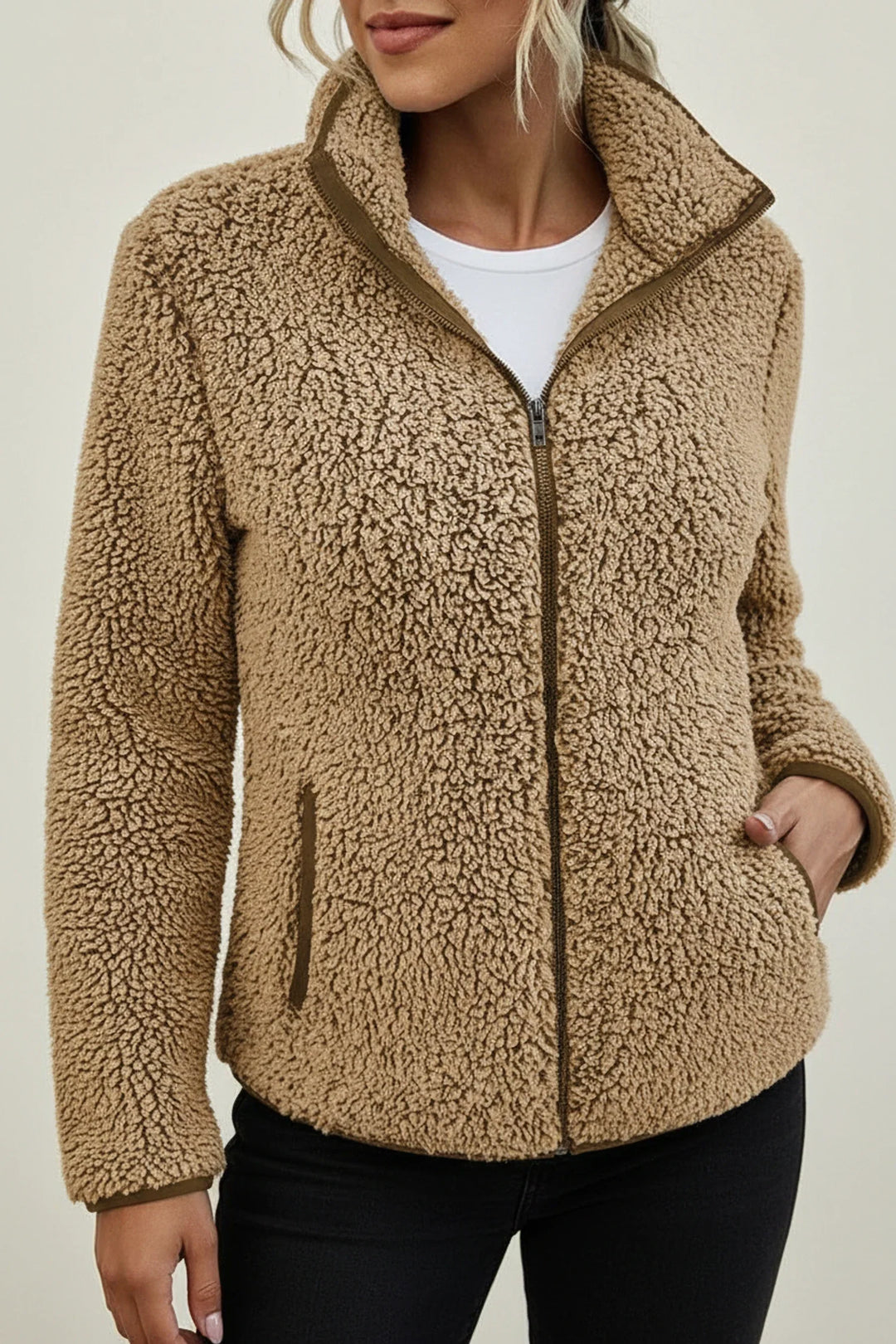 Casual women's zip-up winter jacket, relaxed fit with a stylish stand collar, offering effortless warmth & comfort.