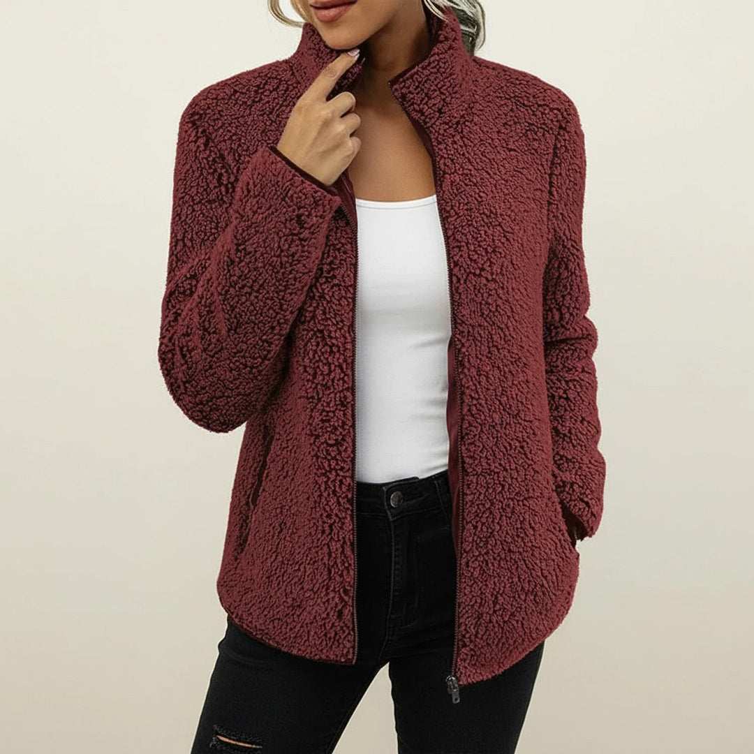 Women's cozy plush winter jacket with a stand collar, zip-up front, perfect for everyday warmth & casual style.