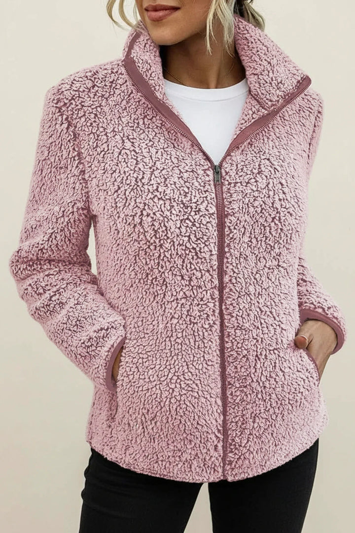 Warm women's plush winter coat, soft & cozy outerwear with a relaxed fit for ultimate comfort in cold weather.